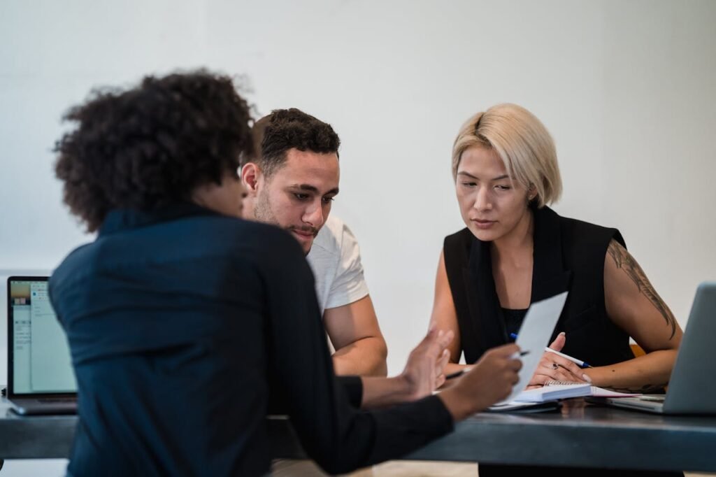 Women and Man on Business Meeting